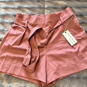 Dusty rose belted shorts size S.
